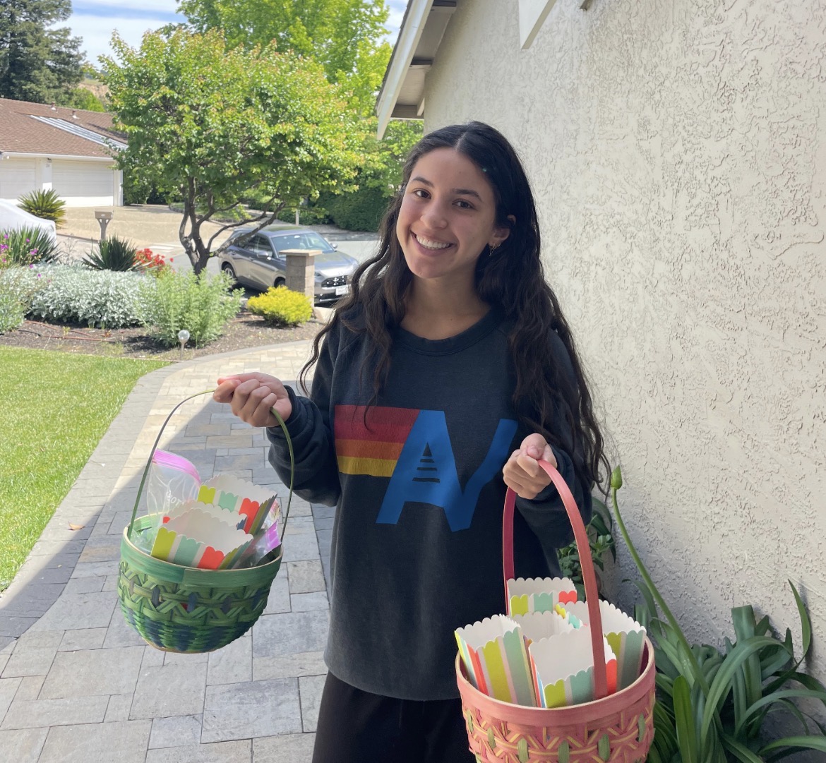 Student volunteer delivering Easter baskets